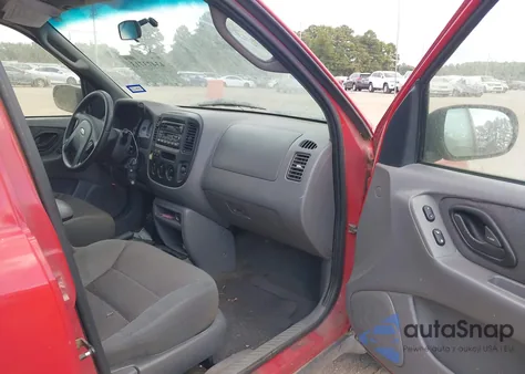 2001 Ford Escape Xlt z USA, uszkodzony, nr VIN 1FMYU031X1KF93444